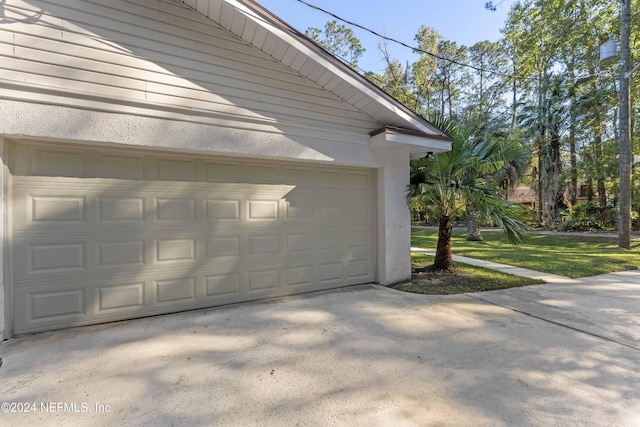 garage with a yard