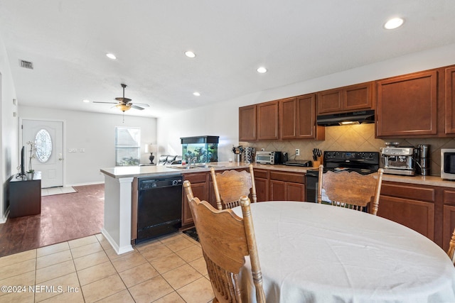 kitchen with backsplash, black appliances, ceiling fan, light wood-type flooring, and kitchen peninsula