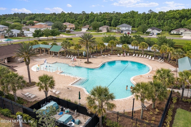 view of swimming pool with a patio