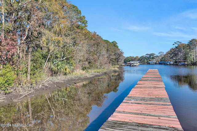 view of dock with a water view