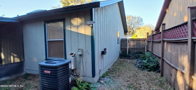 view of home's exterior with cooling unit