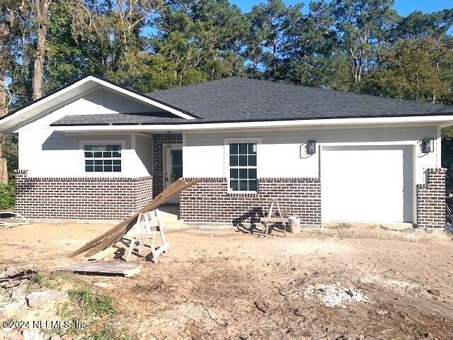 ranch-style house with a garage