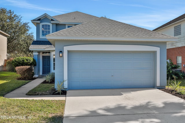 view of front property featuring a garage