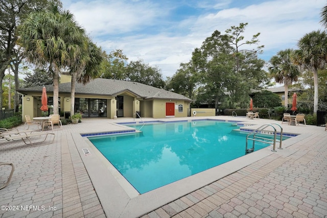 view of pool with a patio