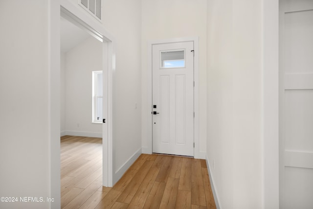 foyer with light hardwood / wood-style floors