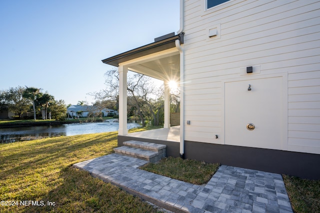 view of patio / terrace with a water view