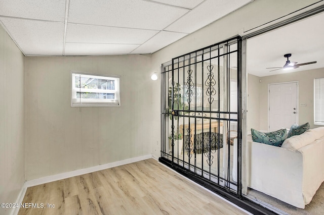 unfurnished room featuring hardwood / wood-style flooring and ceiling fan