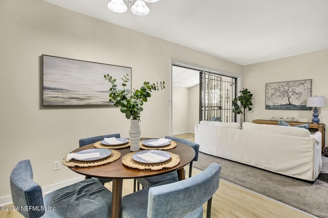 dining area with light wood-type flooring