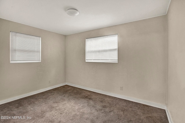 view of carpeted spare room