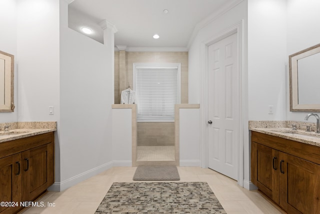 1869 S 2nd St, Jacksonville Beach, FL 32250 - bathroom with walk in shower, two vanities, crown molding, tile patterned flooring, and baseboards