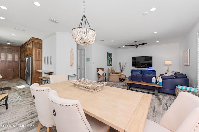 1869 S 2nd St, Jacksonville Beach, FL 32250 - dining area with light wood-style floors, ornamental molding, recessed lighting, ceiling fan, and a chandelier