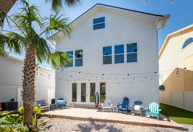 1869 S 2nd St, Jacksonville Beach, FL 32250 - rear view of property featuring a patio, central air condition unit, and french doors