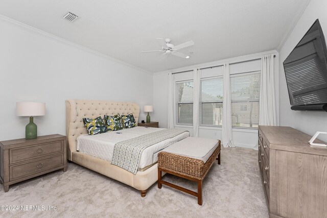 1869 S 2nd St, Jacksonville Beach, FL 32250 - carpeted bedroom featuring crown molding and a ceiling fan