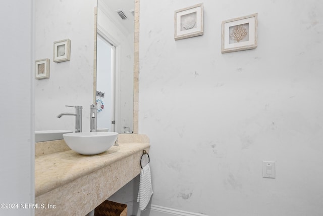 1869 S 2nd St, Jacksonville Beach, FL 32250 - bathroom with vanity and baseboards