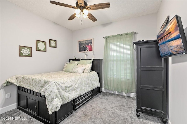 11018 Seneca Ln, Glen St Mary, FL 32040 - carpeted bedroom with baseboards and ceiling fan