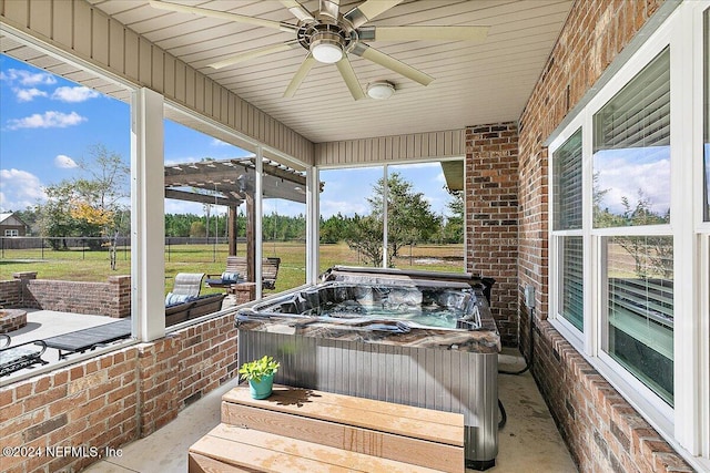 11018 Seneca Ln, Glen St Mary, FL 32040 - sunroom / solarium with a hot tub and ceiling fan