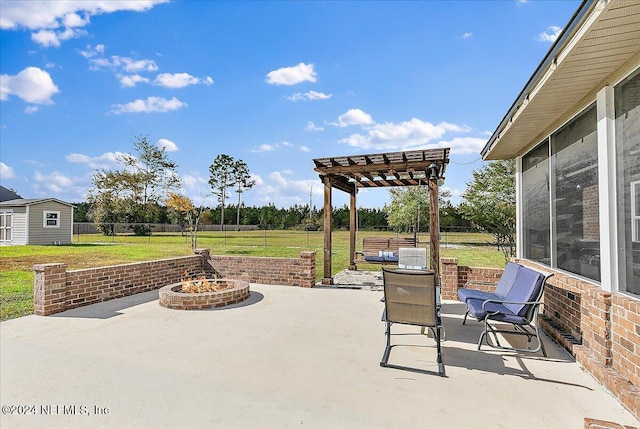 11018 Seneca Ln, Glen St Mary, FL 32040 - view of patio with an outdoor fire pit, a pergola, and an outdoor structure