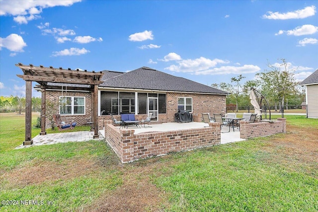 11018 Seneca Ln, Glen St Mary, FL 32040 - back of property with a patio, brick siding, a sunroom, and a pergola