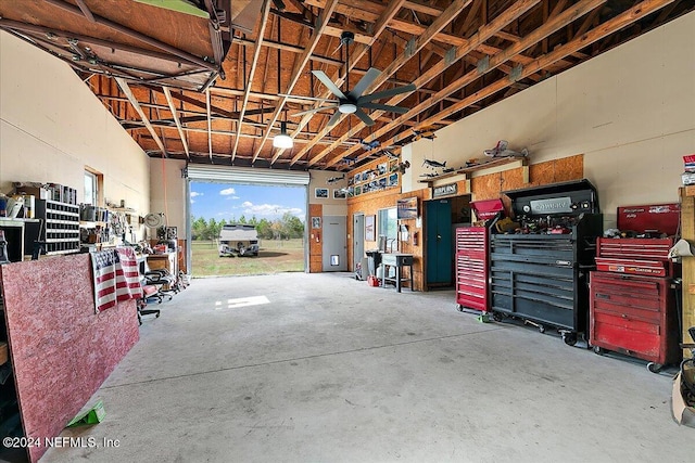 11018 Seneca Ln, Glen St Mary, FL 32040 - garage featuring a workshop area