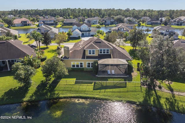 aerial view with a water view and a residential view