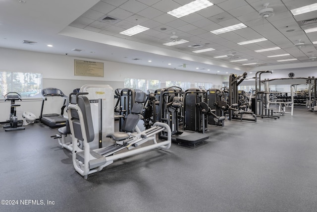 workout area with a paneled ceiling and visible vents