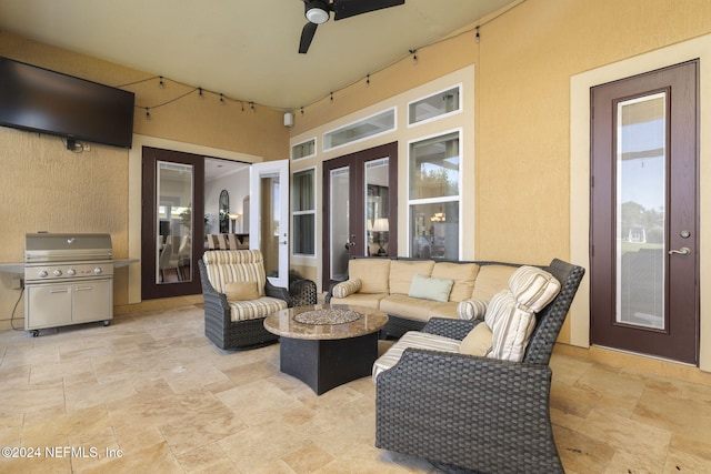 view of patio / terrace featuring an outdoor hangout area, a grill, and a ceiling fan