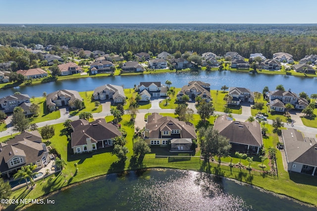 aerial view featuring a water view and a residential view