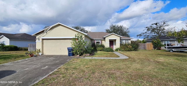 ranch-style home featuring a garage and a front lawn