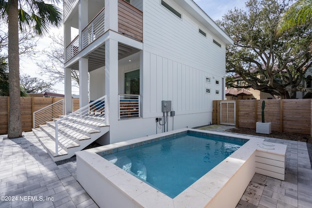 2 Sanchez Cv, Saint Augustine, FL 32080 - view of swimming pool with a fenced backyard and a patio