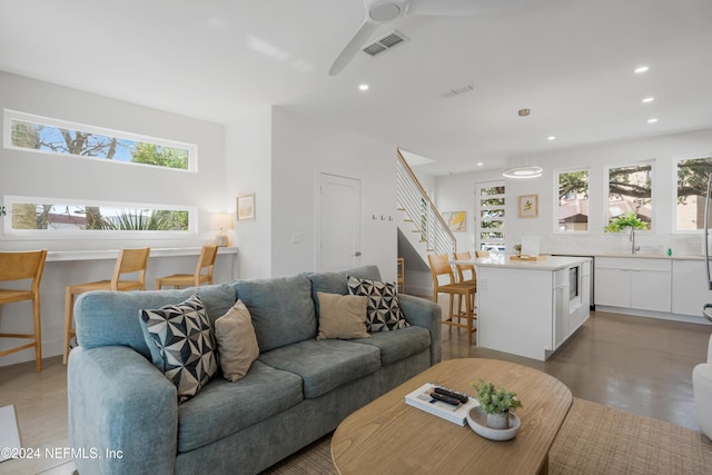 2 Sanchez Cv, Saint Augustine, FL 32080 - living room with recessed lighting, stairs, and ceiling fan