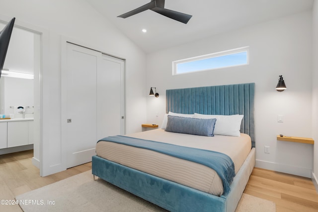 2 Sanchez Cv, Saint Augustine, FL 32080 - bedroom featuring light wood-style flooring, a closet, lofted ceiling, ensuite bath, and a ceiling fan