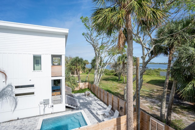 2 Sanchez Cv, Saint Augustine, FL 32080 - view of pool with a fenced backyard, a patio area, and a water view