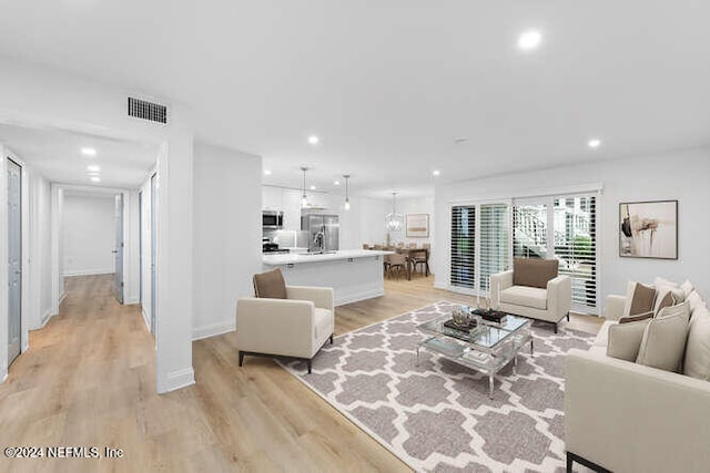 living room with light wood-type flooring