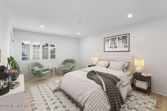 bedroom featuring light wood-type flooring