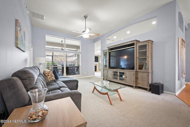 living room with carpet and ceiling fan