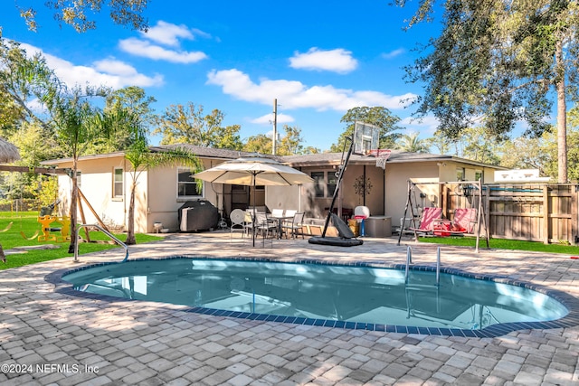 view of pool with a patio area