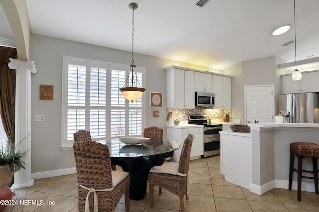 view of tiled dining area