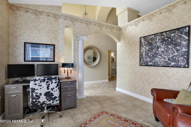 office with light tile patterned floors and lofted ceiling