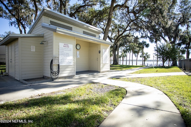 exterior space with a yard