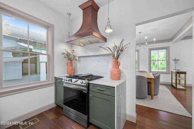 kitchen with custom exhaust hood, stainless steel gas range oven, dark wood-type flooring, and hanging light fixtures