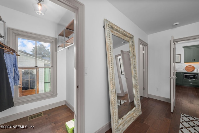 hall featuring dark hardwood / wood-style floors