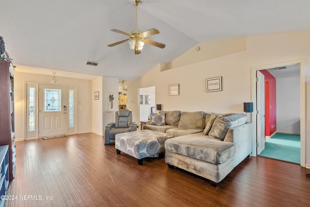 living room featuring ceiling fan, hardwood / wood-style floors, and lofted ceiling