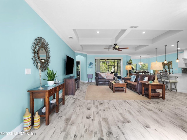 living room featuring ceiling fan, coffered ceiling, beamed ceiling, crown molding, and light wood-type flooring