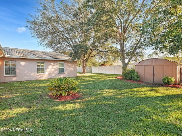 view of yard with a shed