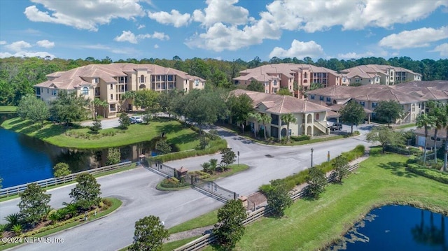 bird's eye view with a water view