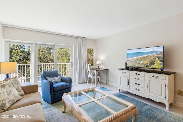 living room with light tile patterned floors