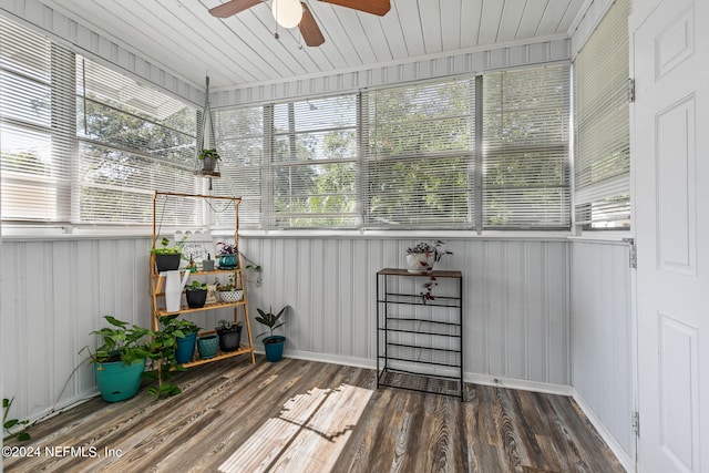 sunroom / solarium with ceiling fan and wood ceiling