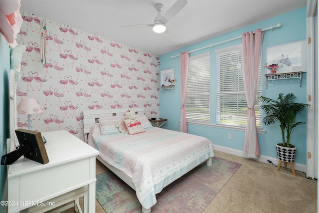 carpeted bedroom with ceiling fan