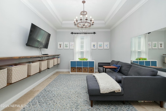 carpeted living room featuring a notable chandelier, crown molding, and a tray ceiling