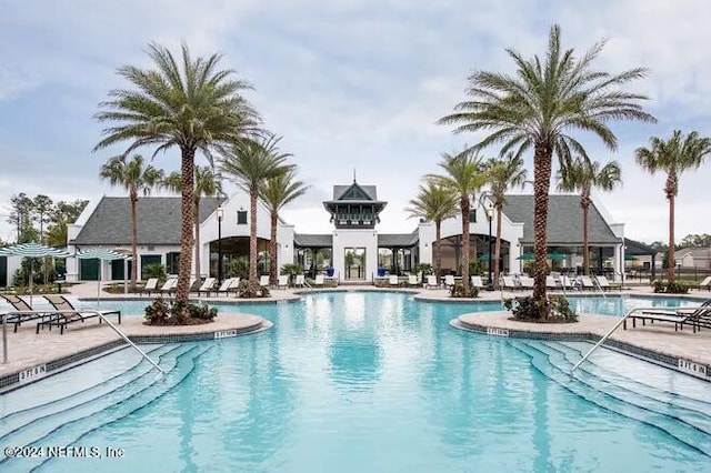 view of swimming pool with a patio area